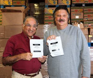 Gopal Kapur delivering BagOfLife to the Placer Food Bank, Mr. Alan Osterstock on the right. 